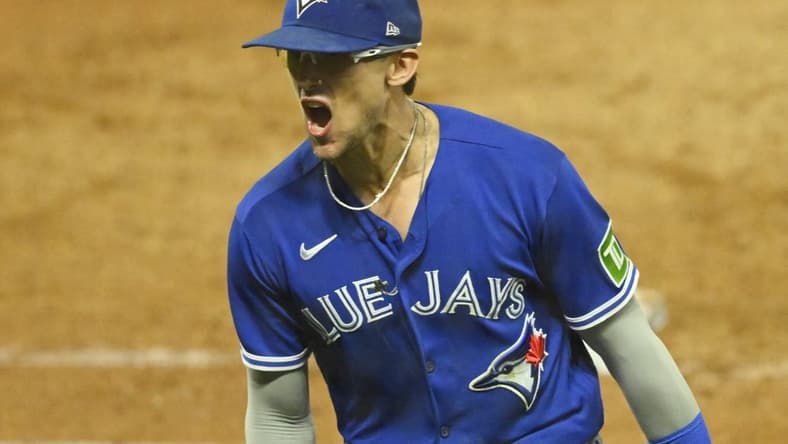 Aug 7, 2023; Cleveland, Ohio, USA; Toronto Blue Jays second baseman Cavan Biggio (8) reacts after completing an unassisted double play in the eighth inning against the Cleveland Guardians at Progressive Field. Mandatory Credit: David Richard-USA TODAY Sports