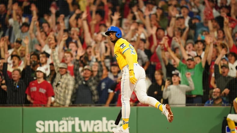 Aug 7, 2023; Boston, Massachusetts, USA; Boston Red Sox shortstop Pablo Reyes (19) hits a grand slam to end the game against the Kansas City Royals in the ninth inning at Fenway Park. Mandatory Credit: David Butler II-USA TODAY Sports