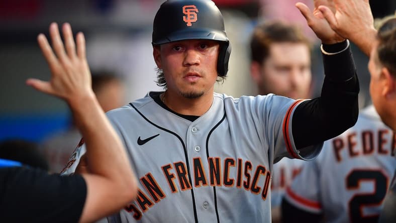 Aug 7, 2023; Anaheim, California, USA; San Francisco Giants first baseman Wilmer Flores (41) is greeted after scoring a run against the Los Angeles Angels during the fourth inning at Angel Stadium. Mandatory Credit: Gary A. Vasquez-USA TODAY Sports