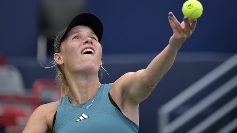 Aug 8, 2023; Montreal, Quebec, Canada; Caroline Wozniacki (DEN) serves against Kimberly Birrell (AUS) (not pictured) during first round play at IGA Stadium. Mandatory Credit: Eric Bolte-USA TODAY Sports