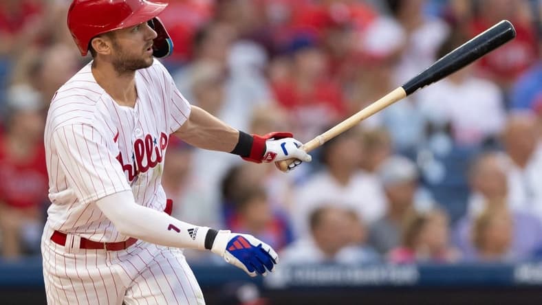 Aug 8, 2023; Philadelphia, Pennsylvania, USA; Philadelphia Phillies shortstop Trea Turner (7) hits an RBI double during the first inning against the Washington Nationals at Citizens Bank Park. Mandatory Credit: Bill Streicher-USA TODAY Sports
