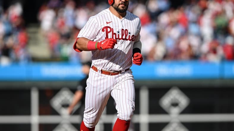 Aug 8, 2023; Philadelphia, Pennsylvania, USA;  Philadelphia Phillies left fielder Kyle Schwarber (12) rounds the bases after hitting a three run home run in the fourth inning against the Washington Nationals at Citizens Bank Park.The Phillies won 8-4. Mandatory Credit: John Geliebter-USA TODAY Sports
