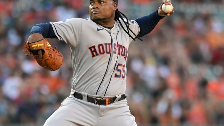 Aug 8, 2023; Baltimore, Maryland, USA; Houston Astros starting pitcher Framber Valdez (59) throws a first inning pitch against the Baltimore Orioles at Oriole Park at Camden Yards. Mandatory Credit: Tommy Gilligan-USA TODAY Sports