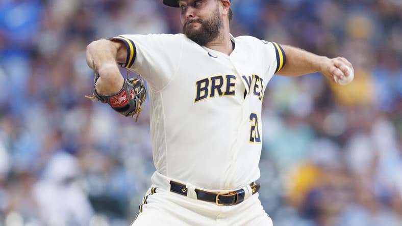 Aug 8, 2023; Milwaukee, Wisconsin, USA;  Milwaukee Brewers pitcher Wade Miley (20) throws a pitch during the first inning against the Colorado Rockies at American Family Field. Mandatory Credit: Jeff Hanisch-USA TODAY Sports