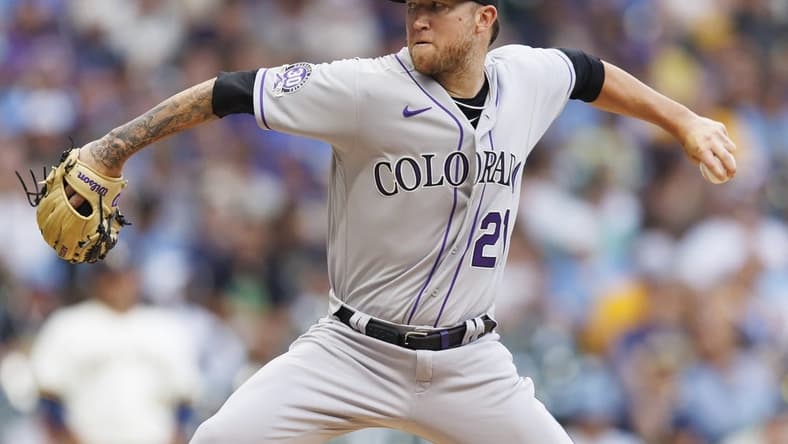 Aug 8, 2023; Milwaukee, Wisconsin, USA;  Colorado Rockies pitcher Kyle Freeland (21) throws a pitch during the first inning against the Milwaukee Brewers at American Family Field. Mandatory Credit: Jeff Hanisch-USA TODAY Sports