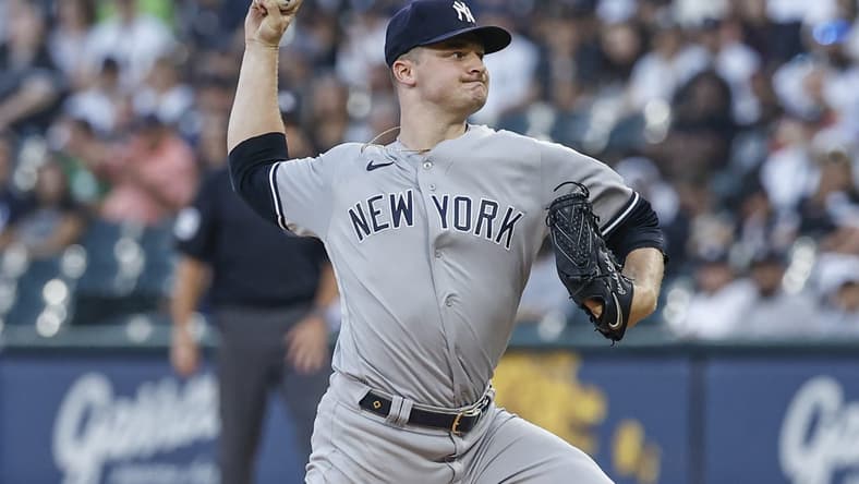 Aug 8, 2023; Chicago, Illinois, USA; New York Yankees starting pitcher Clarke Schmidt (36) delivers a pitch against the Chicago White Sox during the first inning at Guaranteed Rate Field. Mandatory Credit: Kamil Krzaczynski-USA TODAY Sports