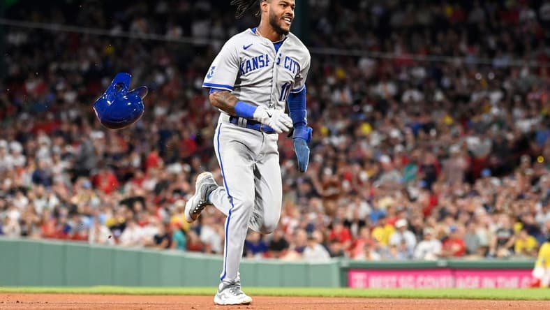 Aug 8, 2023; Boston, Massachusetts, USA; Kansas City Royals third baseman Maikel Garcia (11) steals third base during the sixth inning against the Boston Red Sox at Fenway Park. Mandatory Credit: Eric Canha-USA TODAY Sports