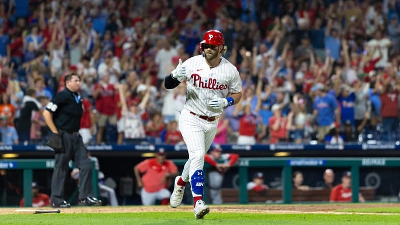 Aug 8, 2023; Philadelphia, Pennsylvania, USA; Philadelphia Phillies designated hitter Bryce Harper (3) reacts after hitting a two RBI home run during the fifth inning against the Washington Nationals at Citizens Bank Park. Mandatory Credit: Bill Streicher-USA TODAY Sports