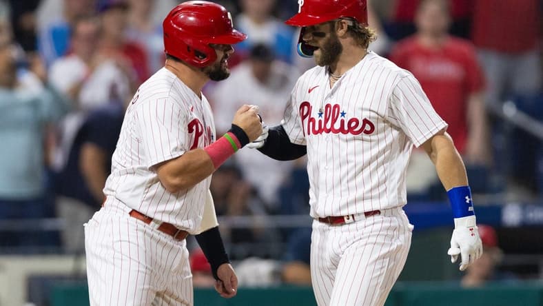 Aug 8, 2023; Philadelphia, Pennsylvania, USA; Philadelphia Phillies designated hitter Bryce Harper (3) celebrates with left fielder Kyle Schwarber (12) after hitting a two RBI home run fifth inning against the Washington Nationals at Citizens Bank Park. Mandatory Credit: Bill Streicher-USA TODAY Sports