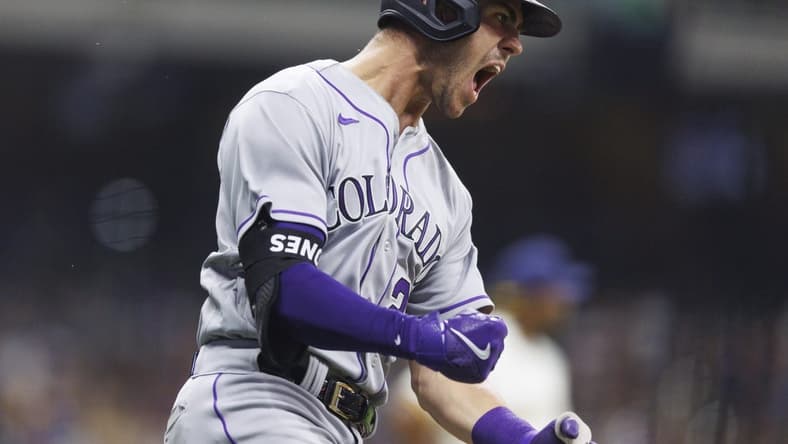 Aug 8, 2023; Milwaukee, Wisconsin, USA;  Colorado Rockies left fielder Nolan Jones (22) reacts after hitting a home run during the seventh inning against the Milwaukee Brewers at American Family Field. Mandatory Credit: Jeff Hanisch-USA TODAY Sports