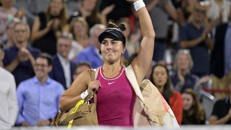 Aug 8, 2023; Montreal, Quebec, Canada; Bianca Andreescu (CAN) waves to the crowd after her defeat against Camila Giorgi (ITA) (not pictured) during first round play at IGA Stadium. Mandatory Credit: Eric Bolte-USA TODAY Sports