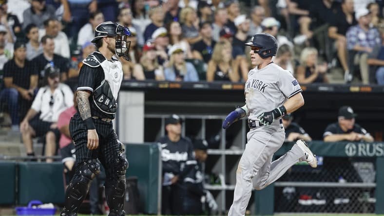 Aug 8, 2023; Chicago, Illinois, USA; New York Yankees center fielder Harrison Bader (22) scores against the Chicago White Sox during the fourth inning at Guaranteed Rate Field. Mandatory Credit: Kamil Krzaczynski-USA TODAY Sports