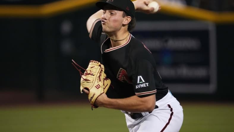 Aug 8, 2023; Phoenix, Arizona, USA; Arizona Diamondbacks starting pitcher Brandon Pfaadt (32) pitches against the Los Angeles Dodgers during the first inning at Chase Field. Mandatory Credit: Joe Camporeale-USA TODAY Sports