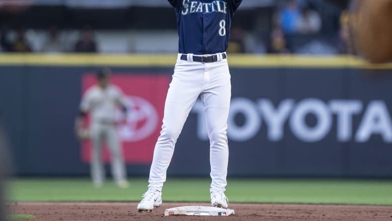 Aug 8, 2023; Seattle, Washington, USA; Seattle Mariners left fielder  Dominic Canzone (8) celebrates after hitting a single during the second inning against the San Diego Padres at T-Mobile Park. Mandatory Credit: Stephen Brashear-USA TODAY Sports