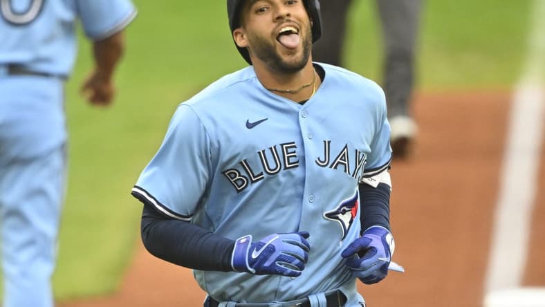 Aug 9, 2023; Cleveland, Ohio, USA; Toronto Blue Jays right fielder George Springer (4) celebrates his solo home run in the first inning against the Cleveland Guardians at Progressive Field. Mandatory Credit: David Richard-USA TODAY Sports
