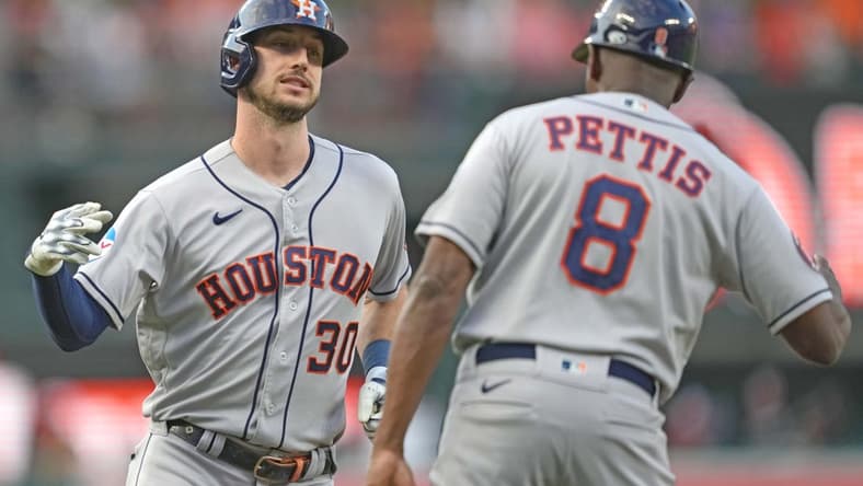 Aug 9, 2023; Baltimore, Maryland, USA; Houston Astros outfielder Kyle Tucker (30) celebrates with coach Gary Pettis (8) following his two run home run in the first inning against the Baltimore Orioles at Oriole Park at Camden Yards. Mandatory Credit: Mitch Stringer-USA TODAY Sports