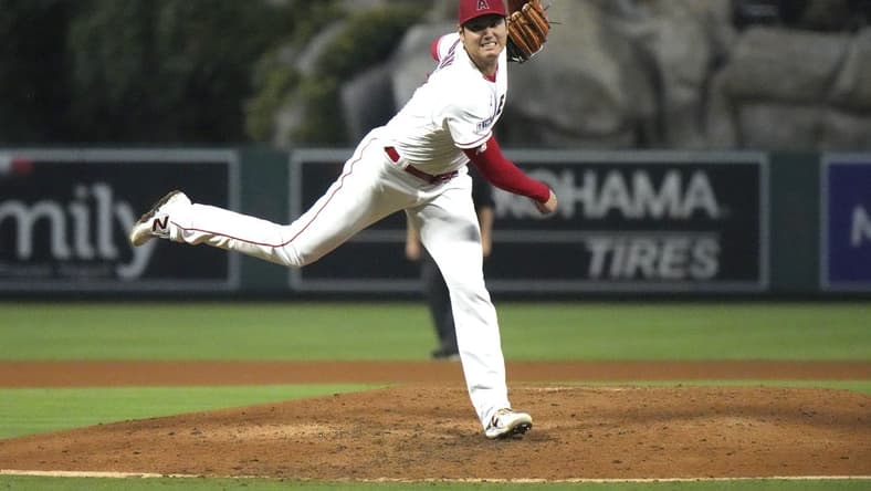 Aug 9, 2023; Anaheim, California, USA; Los Angeles Angels starting pitcher Shohei Ohtani (17) throws in the sixth inning against the San Francisco Giants at Angel Stadium. Mandatory Credit: Kirby Lee-USA TODAY Sports