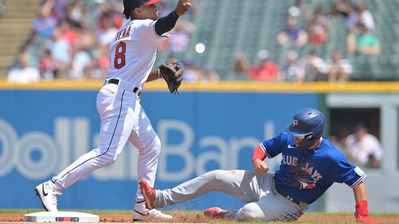 Aug 10, 2023; Cleveland, Ohio, USA; Cleveland Guardians shortstop Jose Tena (8) forces out Toronto Blue Jays left fielder Whit Merrifield (15) and completes the double play during the first inning at Progressive Field. Mandatory Credit: Ken Blaze-USA TODAY Sports