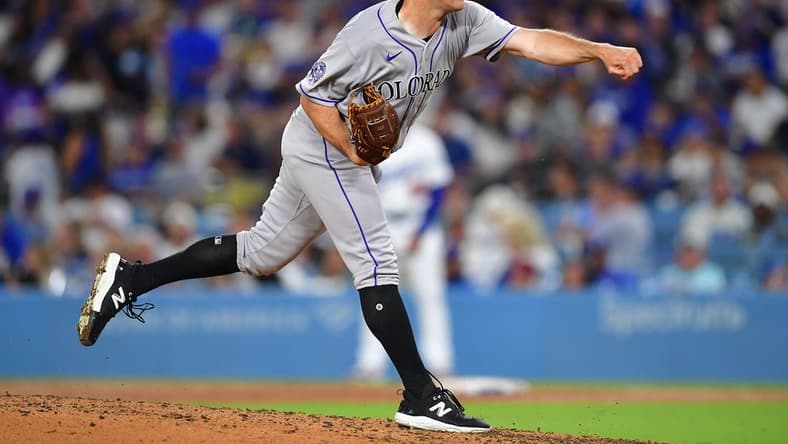 Aug 10, 2023; Los Angeles, California, USA; Colorado Rockies relief pitcher Ty Blach (50) throws against the Los Angeles Dodgers during the sixth inning at Dodger Stadium. Mandatory Credit: Gary A. Vasquez-USA TODAY Sports