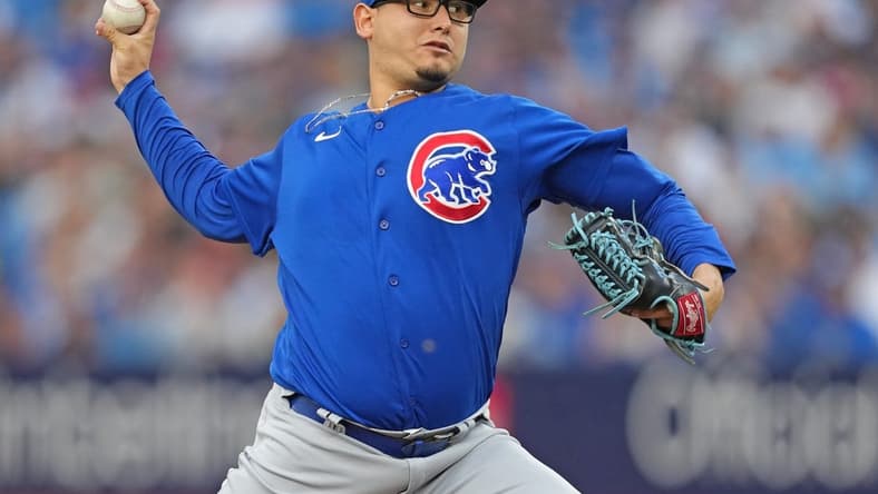 Aug 11, 2023; Toronto, Ontario, CAN; Chicago Cubs starting pitcher Javier Assad (72) throws a pitch against the Toronto Blue Jays during the first inning at Rogers Centre. Mandatory Credit: Nick Turchiaro-USA TODAY Sports