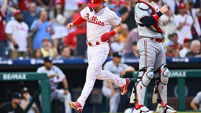 Aug 11, 2023; Philadelphia, Pennsylvania, USA; Philadelphia Phillies second baseman Bryson Stott (5) crosses the plate to score against the Minnesota Twins in the second inning at Citizens Bank Park. Mandatory Credit: Kyle Ross-USA TODAY Sports