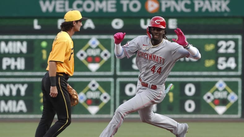 Aug 11, 2023; Pittsburgh, Pennsylvania, USA; Cincinnati Reds third baseman Elly De La Cruz (44) rounds second base on a two-RBI triple against the Pittsburgh Pirates during the first inning at PNC Park. Mandatory Credit: Charles LeClaire-USA TODAY Sports