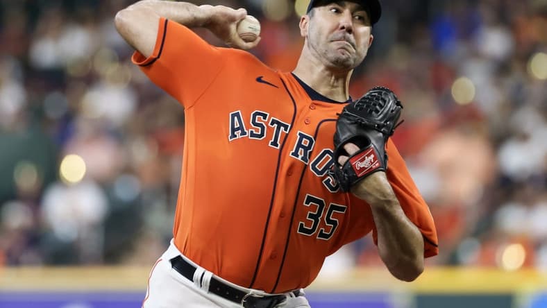 Aug 11, 2023; Houston, Texas, USA;  Houston Astros starting pitcher Justin Verlander (35) pitches against the Los Angeles Angels in the first inning at Minute Maid Park. Mandatory Credit: Thomas Shea-USA TODAY Sports