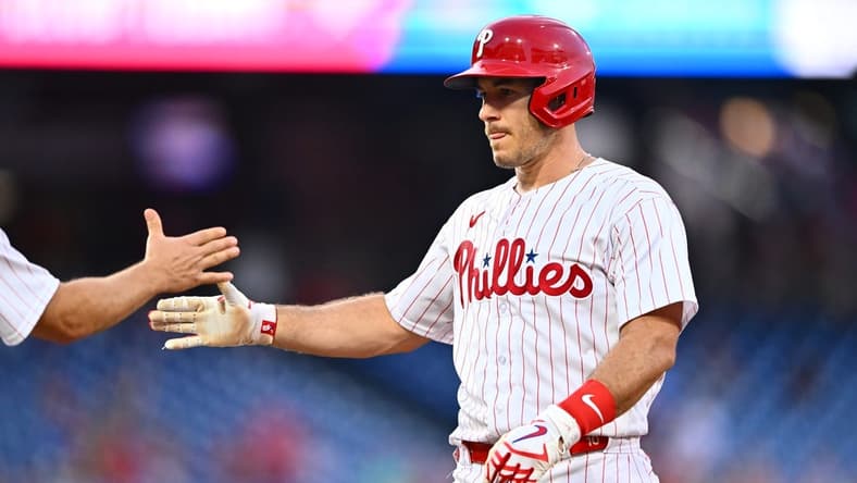 Aug 11, 2023; Philadelphia, Pennsylvania, USA; Philadelphia Phillies catcher J.T. Realmuto (10) reacts after hitting a RBI single against the Minnesota Twins in the second inning at Citizens Bank Park. Mandatory Credit: Kyle Ross-USA TODAY Sports