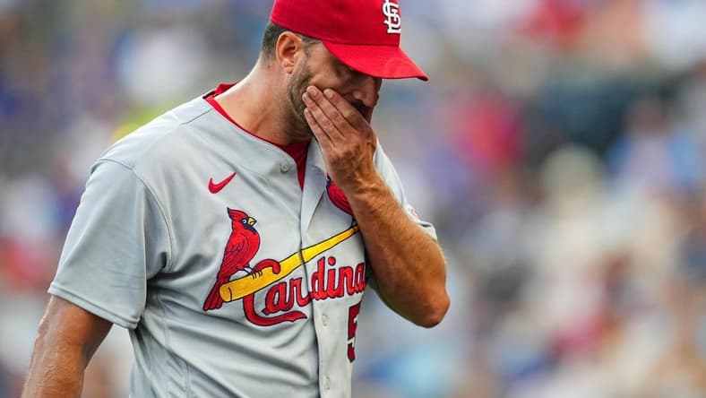 Aug 11, 2023; Kansas City, Missouri, USA; St. Louis Cardinals starting pitcher Adam Wainwright (50) leaves the game during the second inning against the Kansas City Royals at Kauffman Stadium. Mandatory Credit: Jay Biggerstaff-USA TODAY Sports