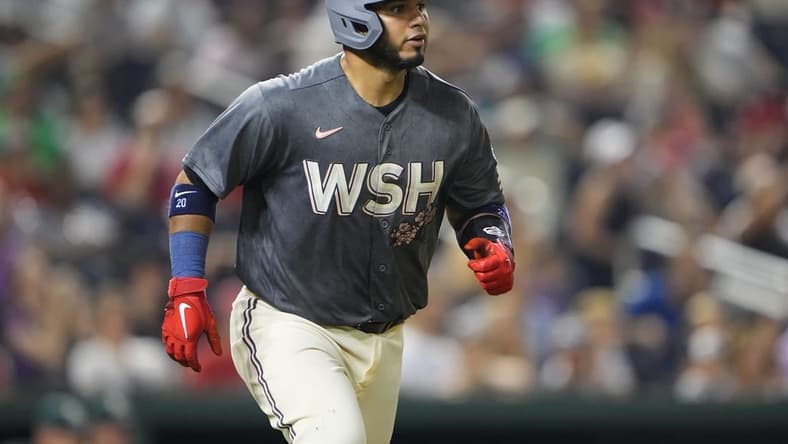 Aug 11, 2023; Washington, District of Columbia, USA; Washington Nationals catcher Keibert Ruiz (20) watches his home run against the Oakland Athletics during the fifth inning at Nationals Park. Mandatory Credit: Gregory Fisher-USA TODAY Sports