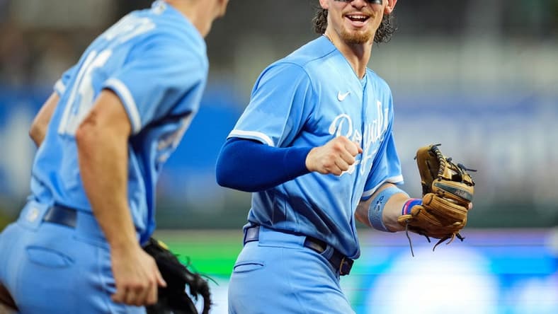 Aug 11, 2023; Kansas City, Missouri, USA; Kansas City Royals shortstop Bobby Witt Jr. (7) reacts after a play by third baseman Matt Duffy (15) to end the eighth inning against the St. Louis Cardinals at Kauffman Stadium. Mandatory Credit: Jay Biggerstaff-USA TODAY Sports