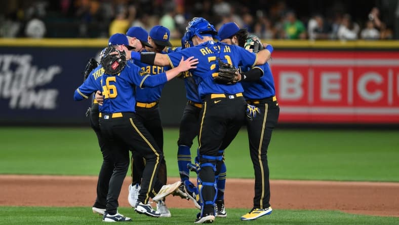 Aug 11, 2023; Seattle, Washington, USA; Seattle Mariners players celebrate defeating the Baltimore Orioles at T-Mobile Park. Mandatory Credit: Steven Bisig-USA TODAY Sports