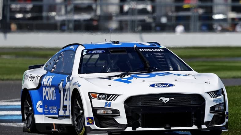 Aug 12, 2023; Speedway, Indiana, USA; NASCAR Cup Series driver Chase Briscoe (14) during qualifying for the Verizon 200 at the Brickyard at Indianapolis Motor Speedway Road Course. Mandatory Credit: Mike Dinovo-USA TODAY Sports