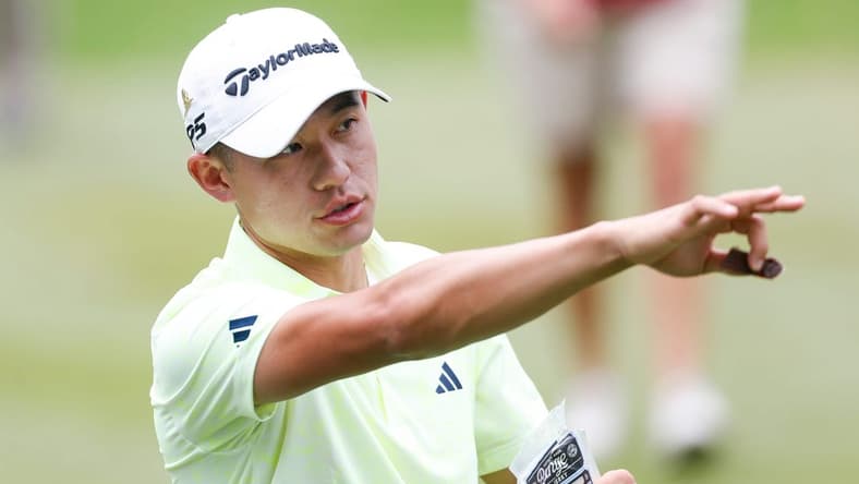 PGA Tour player Collin Morikawa points down the fairway after teeing off on the first hole during the third round of the FedEx St. Jude Championship at TPC Southwind in Memphis, Tenn., on Saturday, August 12, 2023.