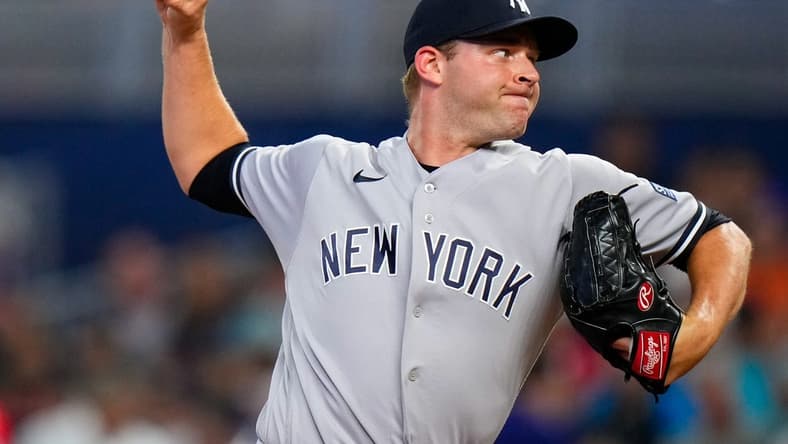 Aug 12, 2023; Miami, Florida, USA; New York Yankees relief pitcher Michael King (34) throws a pitch against the Miami Marlins during the first inning at loanDepot Park. Mandatory Credit: Rich Storry-USA TODAY Sports