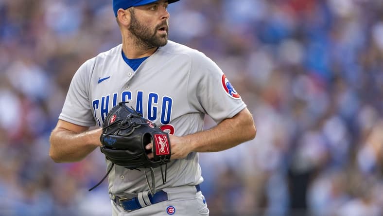 Aug 12, 2023; Toronto, Ontario, CAN; Chicago Cubs relief pitcher Michael Fulmer (32) looks on against the Toronto Blue Jays during the sixth inning at Rogers Centre. Mandatory Credit: Kevin Sousa-USA TODAY Sports