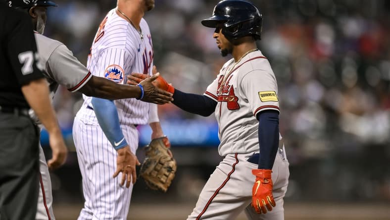 Aug 12, 2023; New York City, New York, USA; Atlanta Braves second baseman Ozzie Albies (1) reacts after hitting a single against the New York Mets during the fourth inning at Citi Field. Mandatory Credit: John Jones-USA TODAY Sports