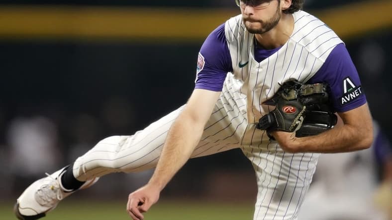 Aug 12, 2023; Phoenix, AZ, USA; Arizona Diamondbacks' Zac Gallen (23) pitches against the San Diego Padres at Chase Field.