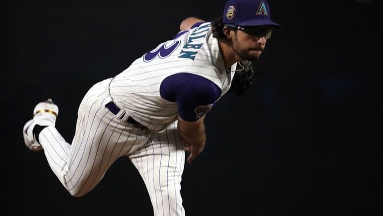 Aug 12, 2023; Phoenix, Arizona, USA; Arizona Diamondbacks starting pitcher Zac Gallen (23) pitches against the San Diego Padres during the fifth inning at Chase Field. Mandatory Credit: Joe Camporeale-USA TODAY Sports