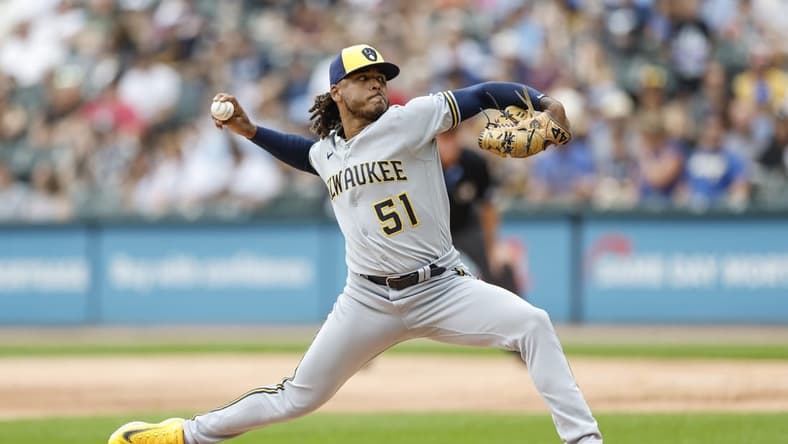 Aug 13, 2023; Chicago, Illinois, USA; Milwaukee Brewers starting pitcher Freddy Peralta (51) delivers a pitch against the Chicago White Sox during the first inning at Guaranteed Rate Field. Mandatory Credit: Kamil Krzaczynski-USA TODAY Sports
