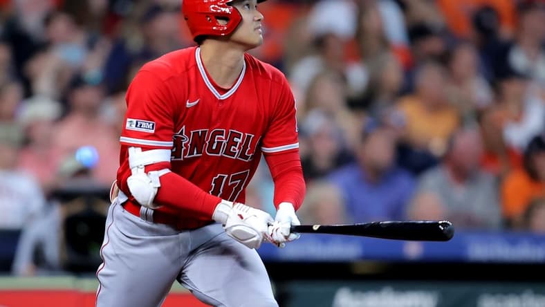 Aug 13, 2023; Houston, Texas, USA; Los Angeles Angels designated hitter Shohei Ohtani (17) hits a home run to center field against the Houston Astros during the sixth inning at Minute Maid Park. Mandatory Credit: Erik Williams-USA TODAY Sports