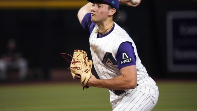 Aug 13, 2023; Phoenix, Arizona, USA; Arizona Diamondbacks starting pitcher Brandon Pfaadt (32) pitches against the San Diego Padres during the first inning at Chase Field. Mandatory Credit: Joe Camporeale-USA TODAY Sports