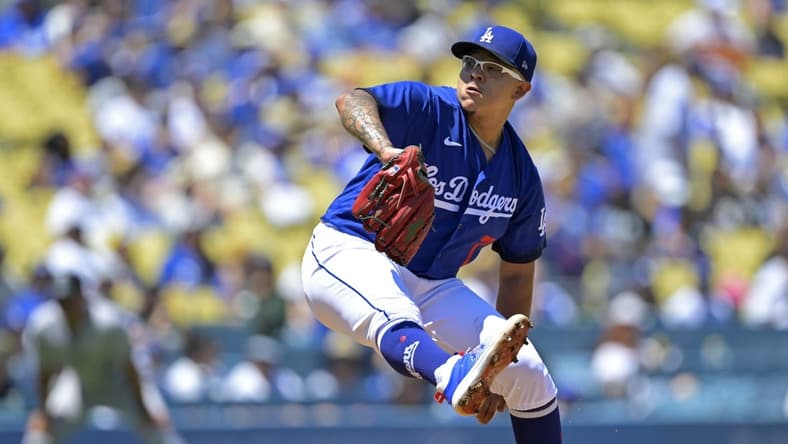 Aug 13, 2023; Los Angeles, California, USA;  Los Angeles Dodgers starting pitcher Julio Urias (7) throws to the plate in the first inning against the Colorado Rockies at Dodger Stadium. Mandatory Credit: Jayne Kamin-Oncea-USA TODAY Sports