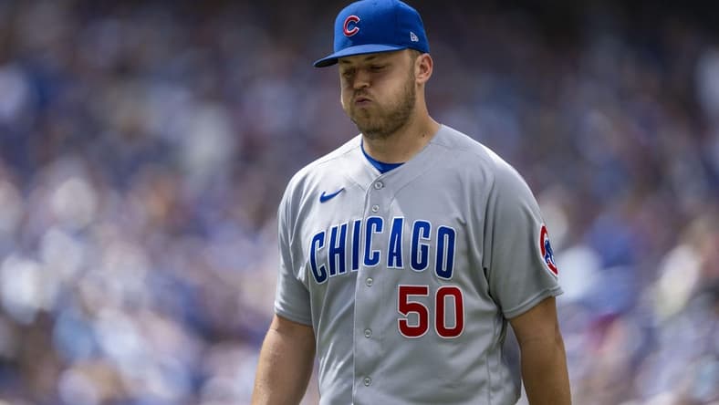 Aug 13, 2023; Toronto, Ontario, CAN; Chicago Cubs starting pitcher Jameson Taillon (50) reacts after being taken out of the game during the fourth inning against the Toronto Blue Jays at Rogers Centre. Mandatory Credit: Kevin Sousa-USA TODAY Sports