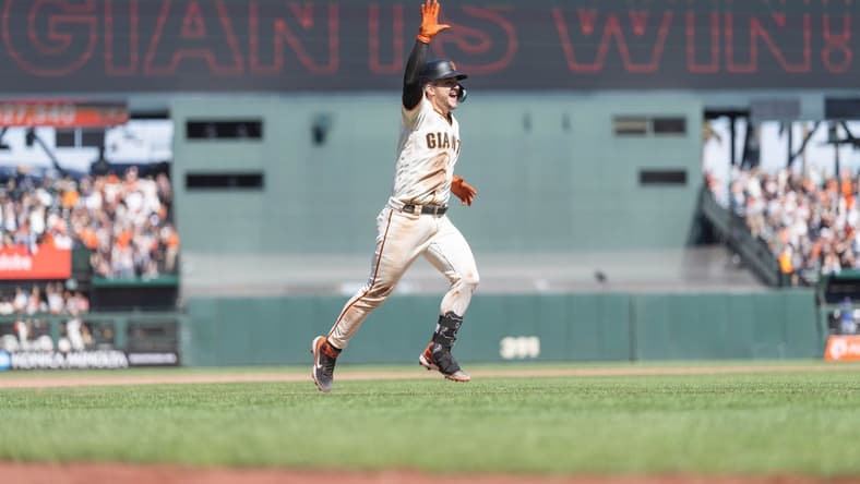 Aug 13, 2023; San Francisco, California, USA; San Francisco Giants catcher Patrick Bailey (14) celebrates after hitting a two-run walk off home run during the tenth inning to defeat the Texas Rangers at Oracle Park. Mandatory Credit: Stan Szeto-USA TODAY Sports