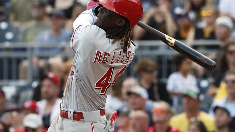 Aug 13, 2023; Pittsburgh, PA, USA; Cincinnati Reds shortstop Elly De La Cruz (44) hits a solo home run against the Pittsburgh Pirates during the third inning at PNC Park. Mandatory Credit: Charles LeClaire-USA TODAY Sports