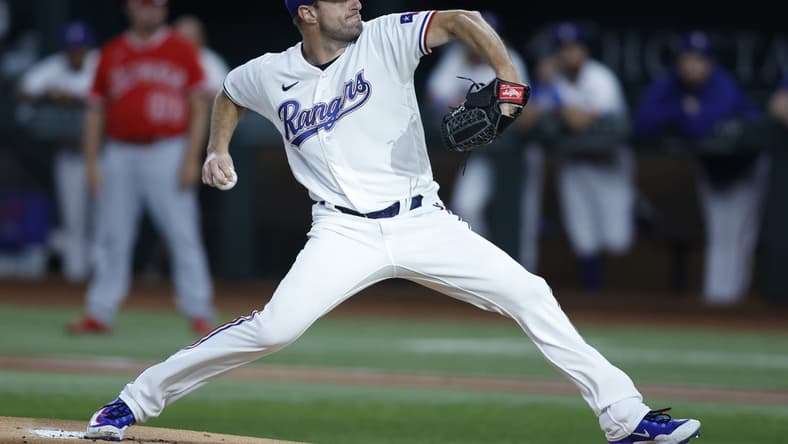 Aug 14, 2023; Arlington, Texas, USA; Texas Rangers starting pitcher Max Scherzer (31) throws a pitch in the first inning against the Los Angeles Angels at Globe Life Field. Mandatory Credit: Tim Heitman-USA TODAY Sports