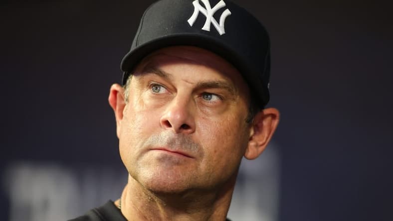 Aug 14, 2023; Atlanta, Georgia, USA; New York Yankees manager Aaron Boone (17) in the dugout against the Atlanta Braves in the third inning at Truist Park. Mandatory Credit: Brett Davis-USA TODAY Sports