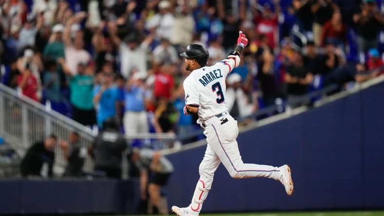 Aug 14, 2023; Miami, Florida, USA; Miami Marlins second baseman Luis Arraez (3) rounds the bases after hitting a home run against the Houston Astros during the eighth inning at loanDepot Park. Mandatory Credit: Rich Storry-USA TODAY Sports