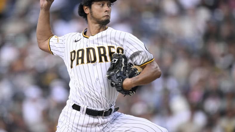 Aug 14, 2023; San Diego, California, USA; San Diego Padres starting pitcher Yu Darvish (11) throws a pitch against the Baltimore Orioles during the first inning at Petco Park. Mandatory Credit: Orlando Ramirez-USA TODAY Sports